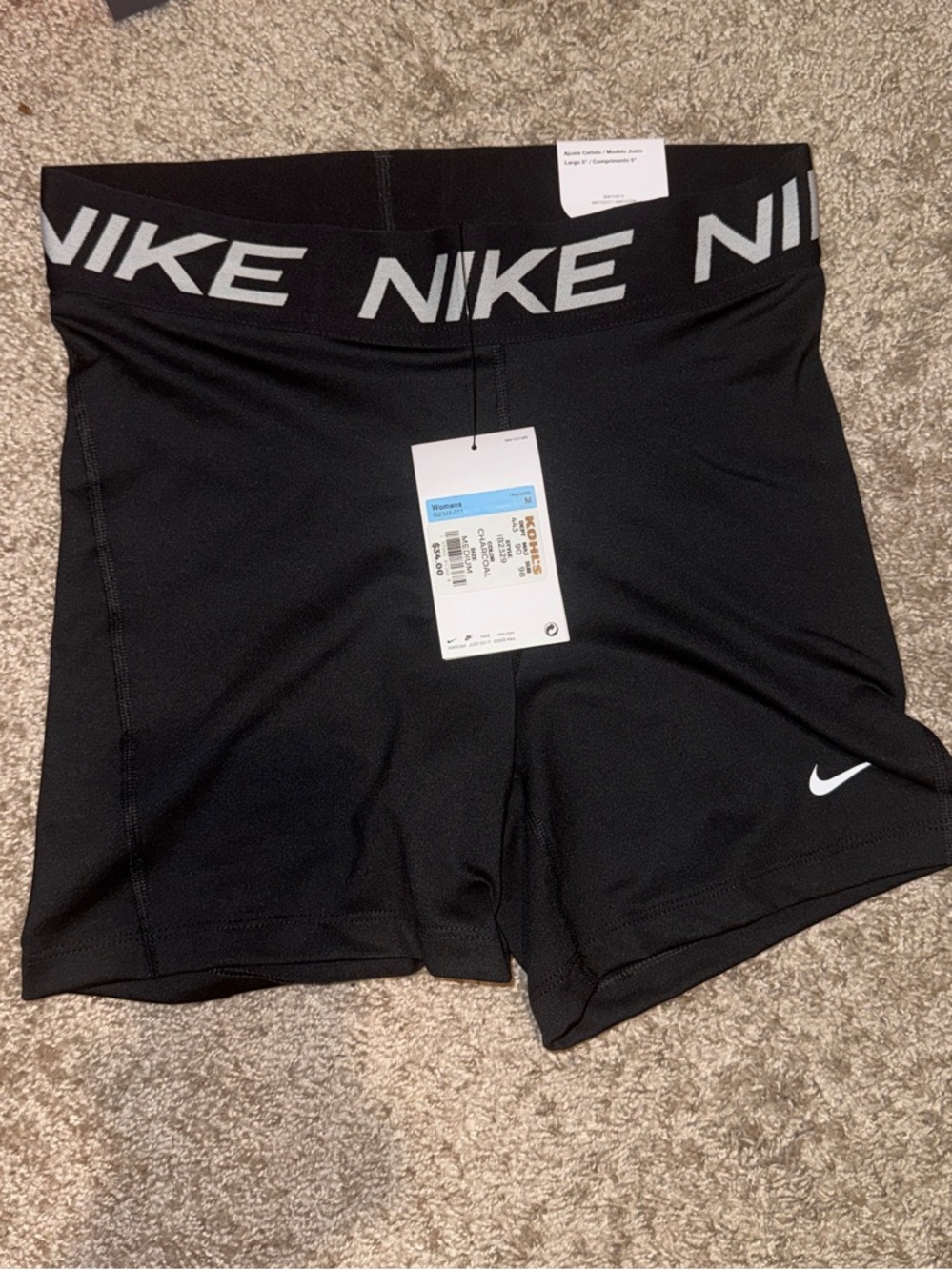 Nike Black Athletic Shorts with White Logo Print